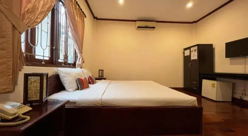 Bed in Souphaphone Hotel Bed in Souphaphone Hotel