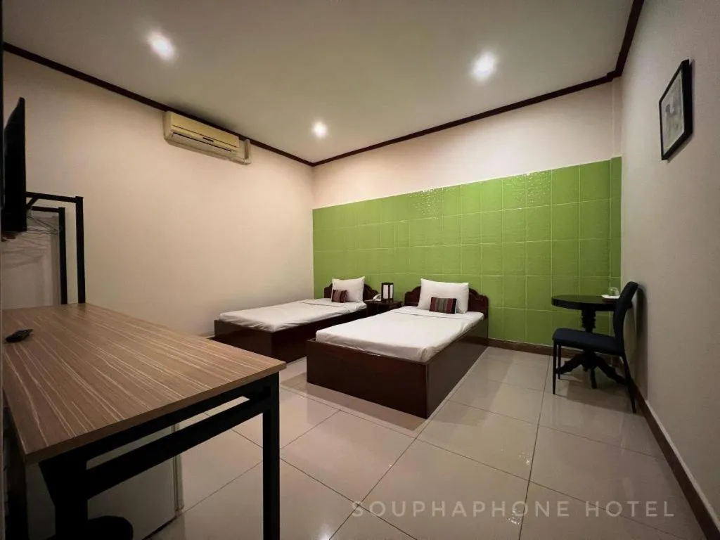 Bed in Souphaphone Hotel
