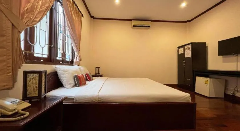 Bed in Souphaphone Hotel