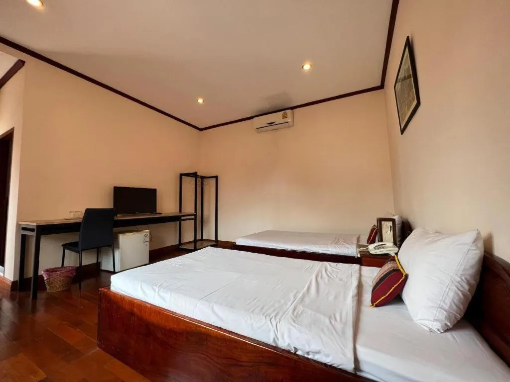 Bed in Souphaphone Hotel