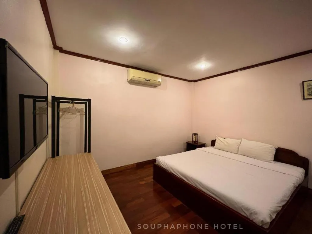 Bed in Souphaphone Hotel