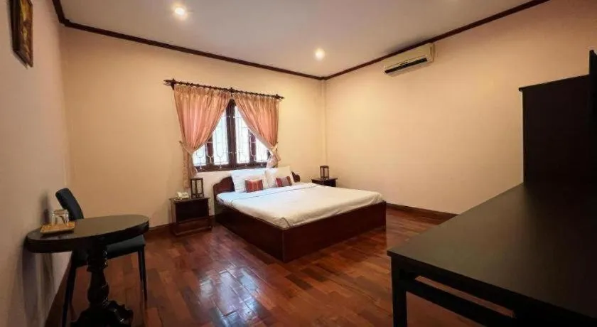 Bed in Souphaphone Hotel