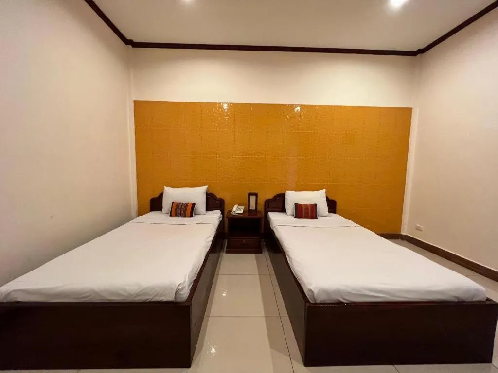 Bed in Souphaphone Hotel