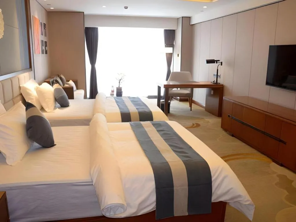 Bed in Metropolo Hotel Chengdu Wuhou Wanda Plaza