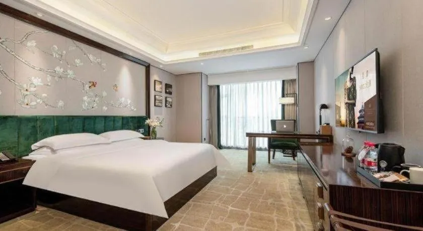Bed in Metropolo Hotel Chengdu Wuhou Wanda Plaza