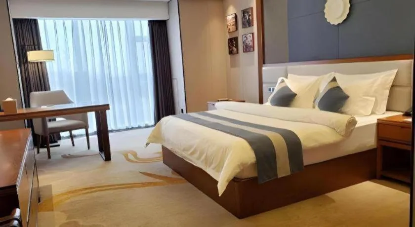 Bed in Metropolo Hotel Chengdu Wuhou Wanda Plaza