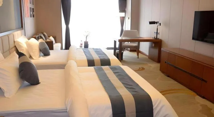 Bed in Metropolo Hotel Chengdu Wuhou Wanda Plaza