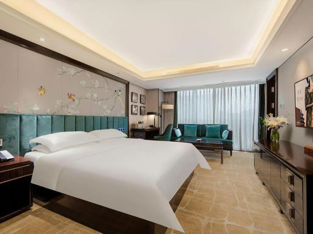 Bed in Metropolo Hotel Chengdu Wuhou Wanda Plaza