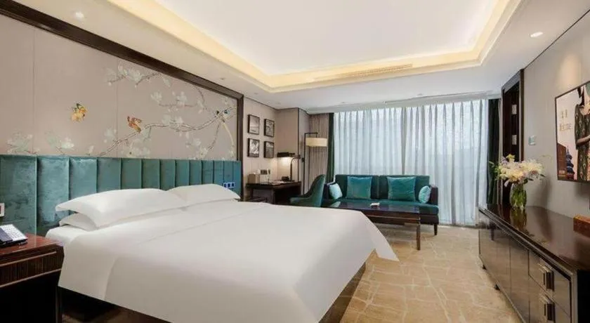 Bed in Metropolo Hotel Chengdu Wuhou Wanda Plaza