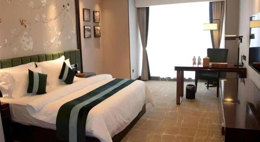 Bed in Metropolo Hotel Chengdu Wuhou Wanda Plaza