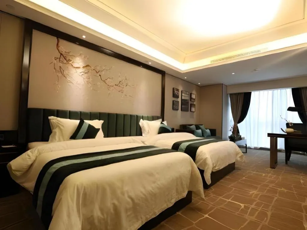 Bed in Metropolo Hotel Chengdu Wuhou Wanda Plaza