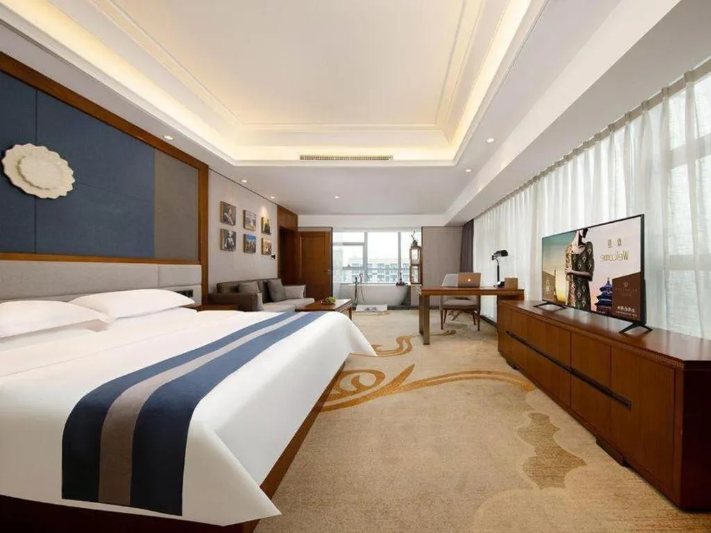 Bed in Metropolo Hotel Chengdu Wuhou Wanda Plaza