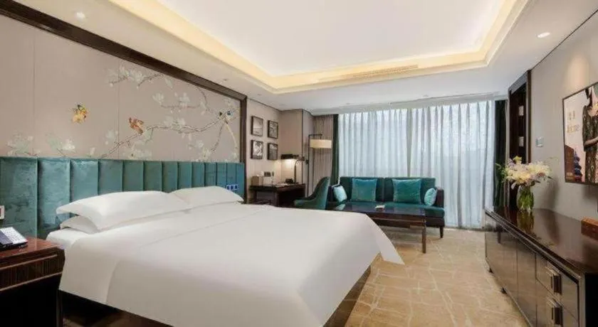 Bed in Metropolo Hotel Chengdu Wuhou Wanda Plaza