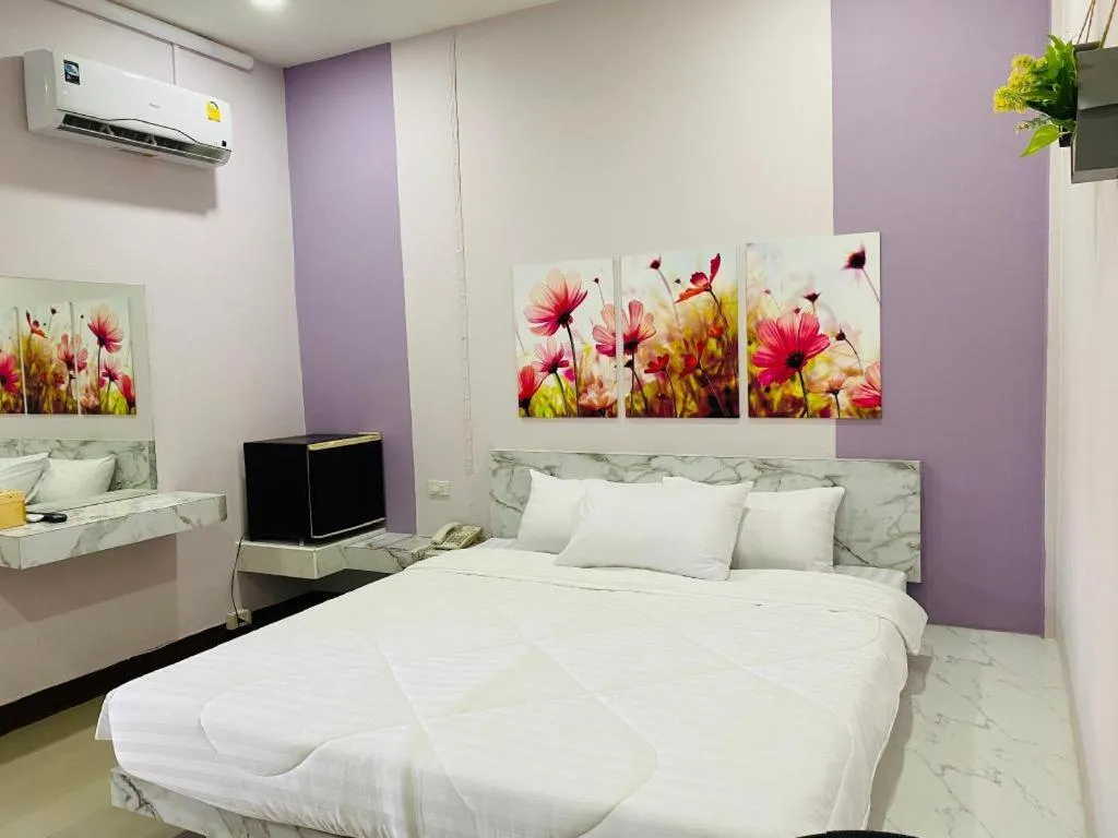 Bed in Sweet Hug Hotel