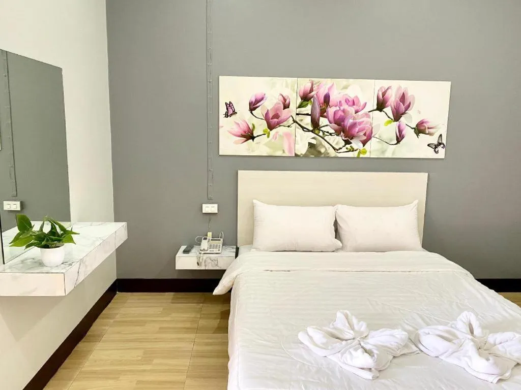 Bed in Sweet Hug Hotel