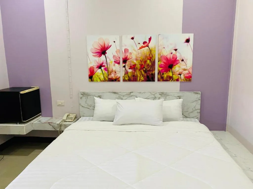 Bed in Sweet Hug Hotel