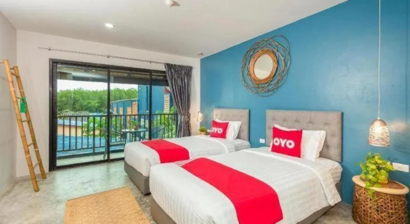 Bed in OYO 422 Jane Homestay and Resort