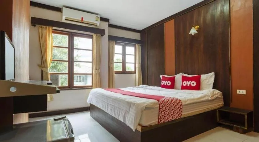 Bed in OYO 75356 Thipsiri Lodge