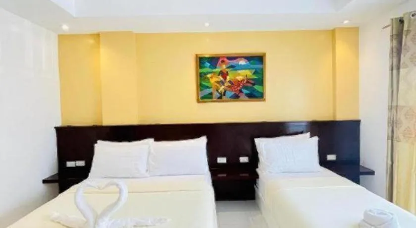 Bed in Alice in Wonderland Beach Hotel