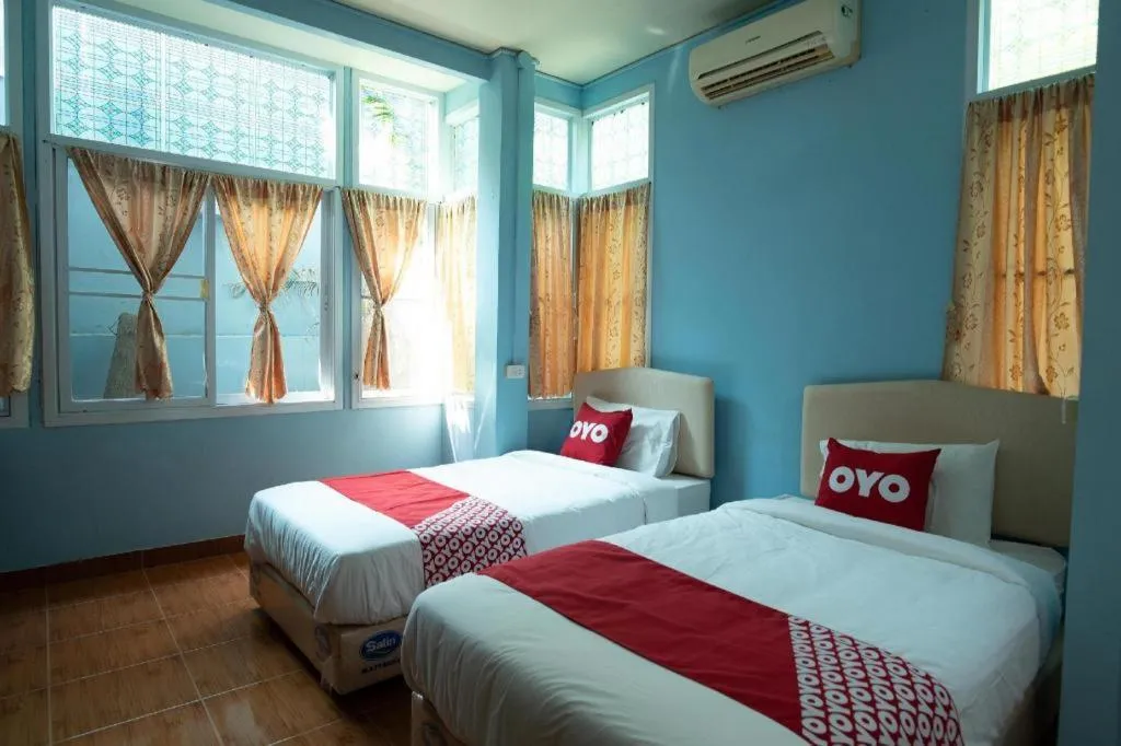 Bed in Raknatee Resort