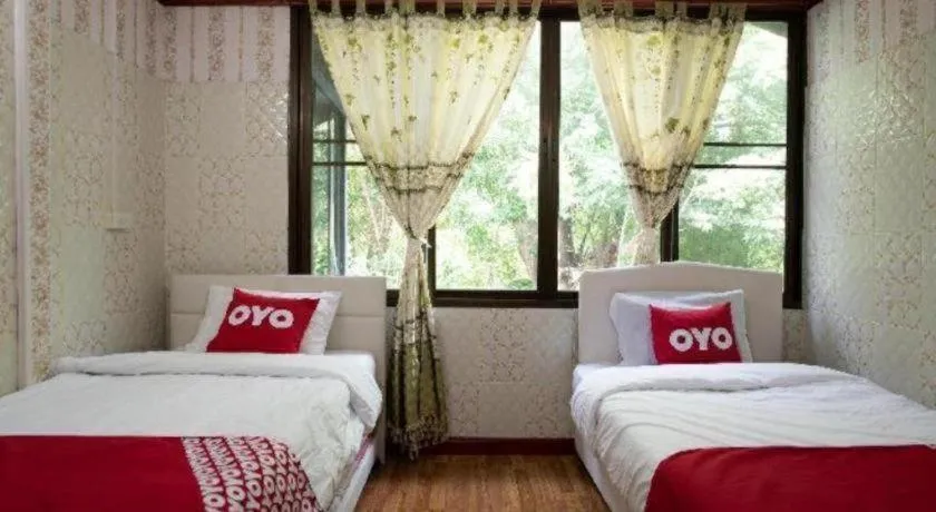 Bed in Raknatee Resort