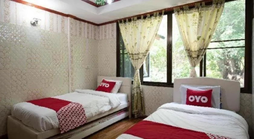 Bed in Raknatee Resort