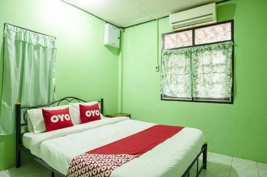 Bed in Raknatee Resort