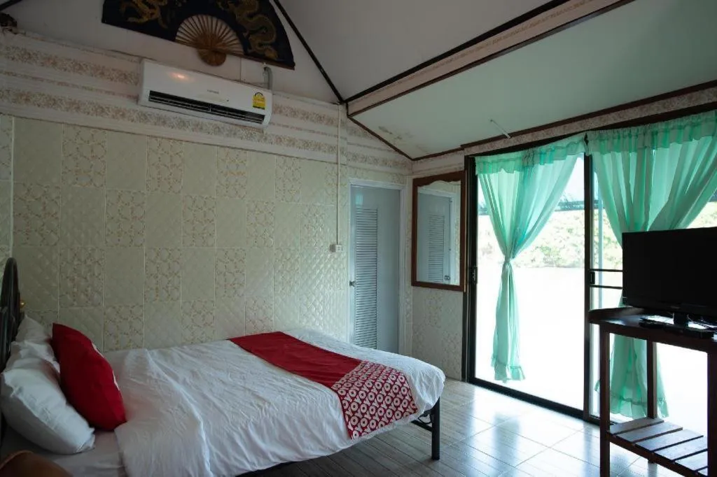 Bed in Raknatee Resort