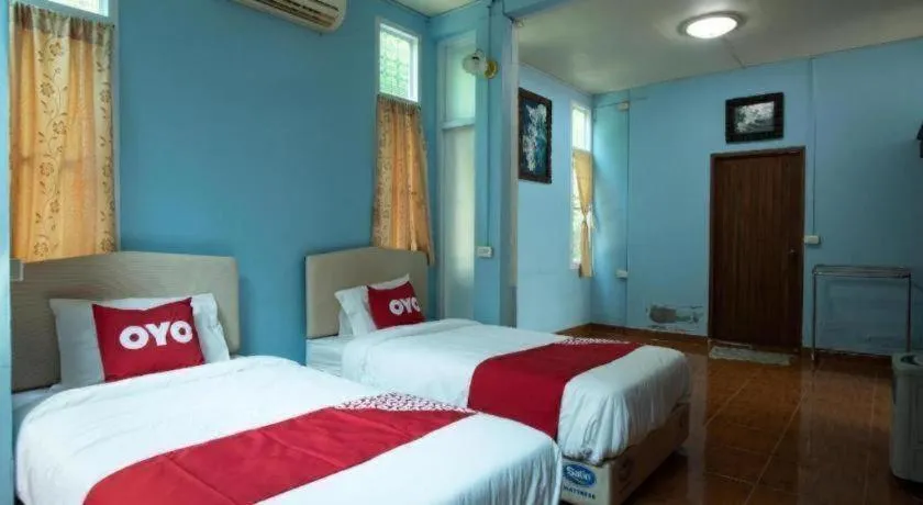 Bed in Raknatee Resort