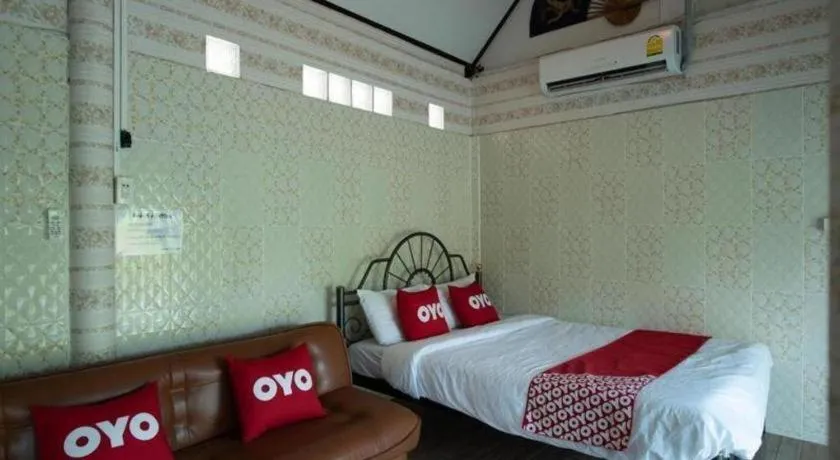 Bed in Raknatee Resort