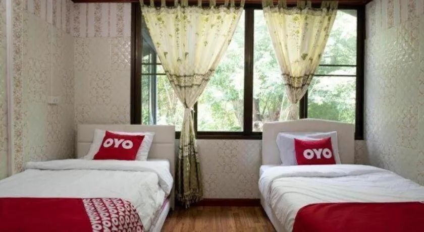 Bed in Raknatee Resort