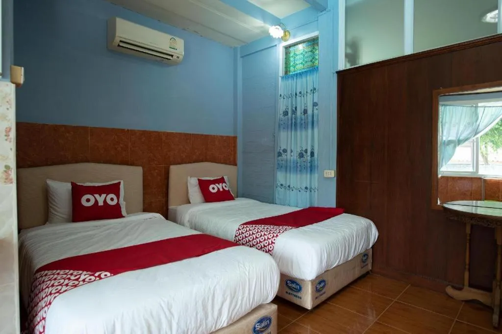 Bed in Raknatee Resort