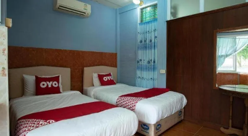 Bed in Raknatee Resort