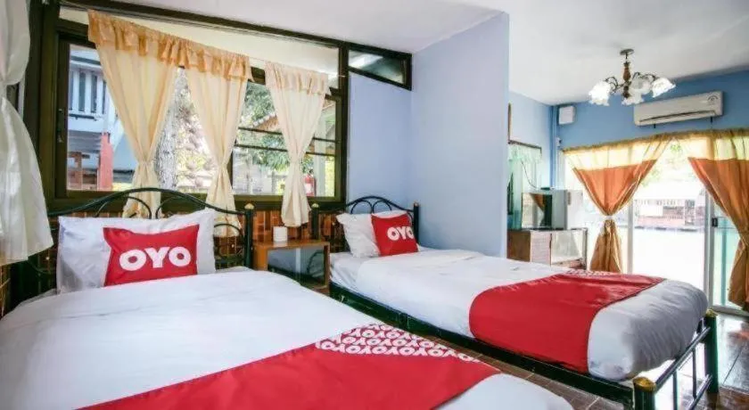 Bed in Raknatee Resort