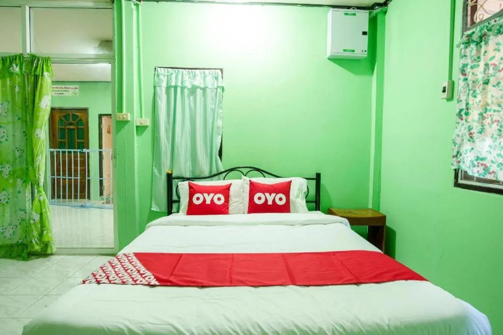 Bed in Raknatee Resort