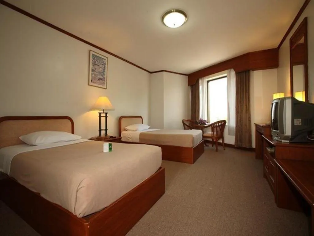 Bed in Royal Diamond Hotel