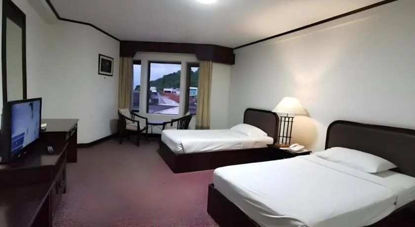 Bed in Royal Diamond Hotel