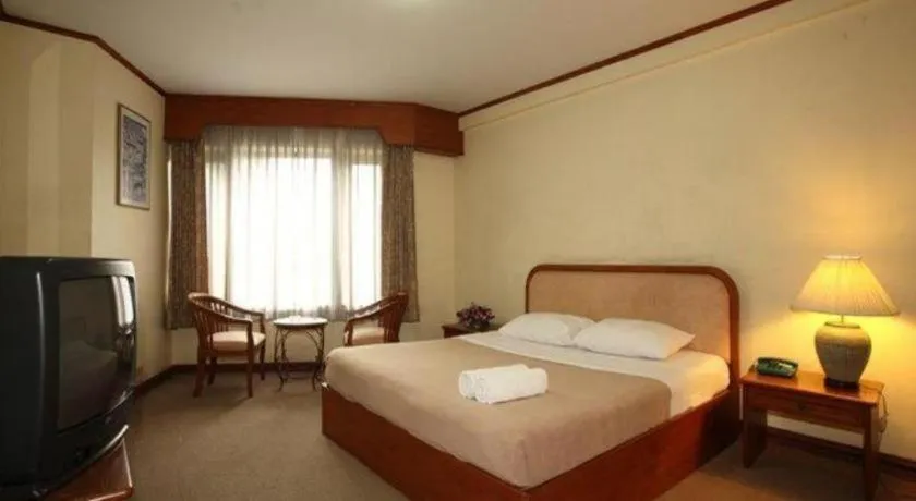 Bed in Royal Diamond Hotel