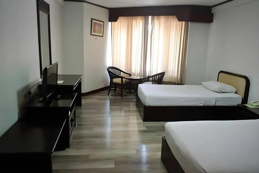 Bed in Royal Diamond Hotel