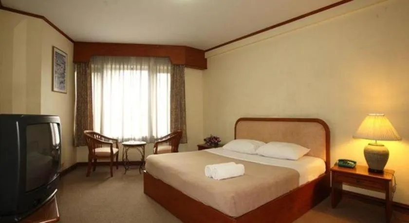 Bed in Royal Diamond Hotel