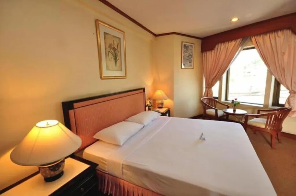 Bed in Royal Diamond Hotel