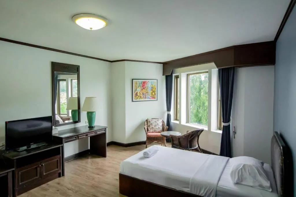 Bed in Royal Diamond Hotel