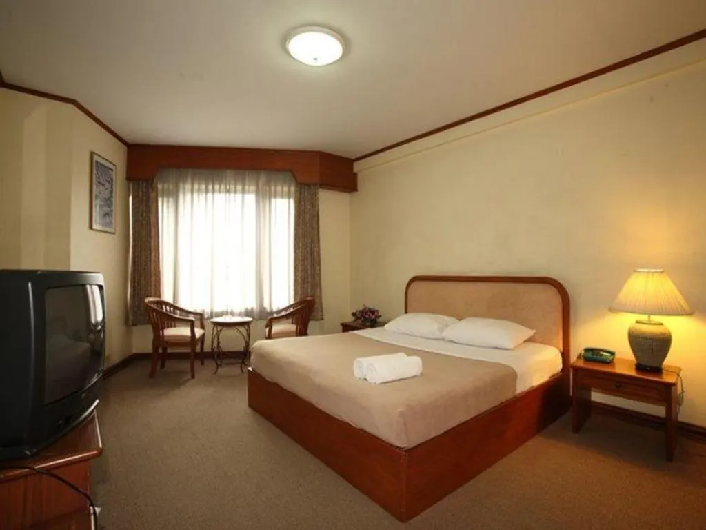 Bed in Royal Diamond Hotel