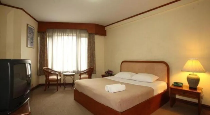 Bed in Royal Diamond Hotel