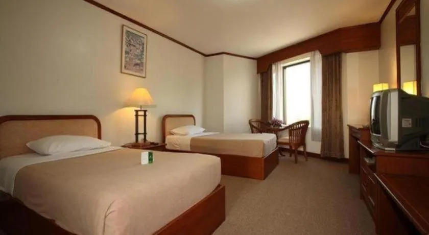 Bed in Royal Diamond Hotel