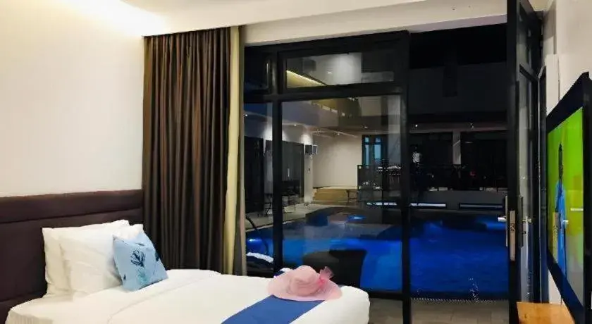 Bed in White Breeze Palawan Boutique Hotel Bed in White Breeze Palawan Boutique Hotel