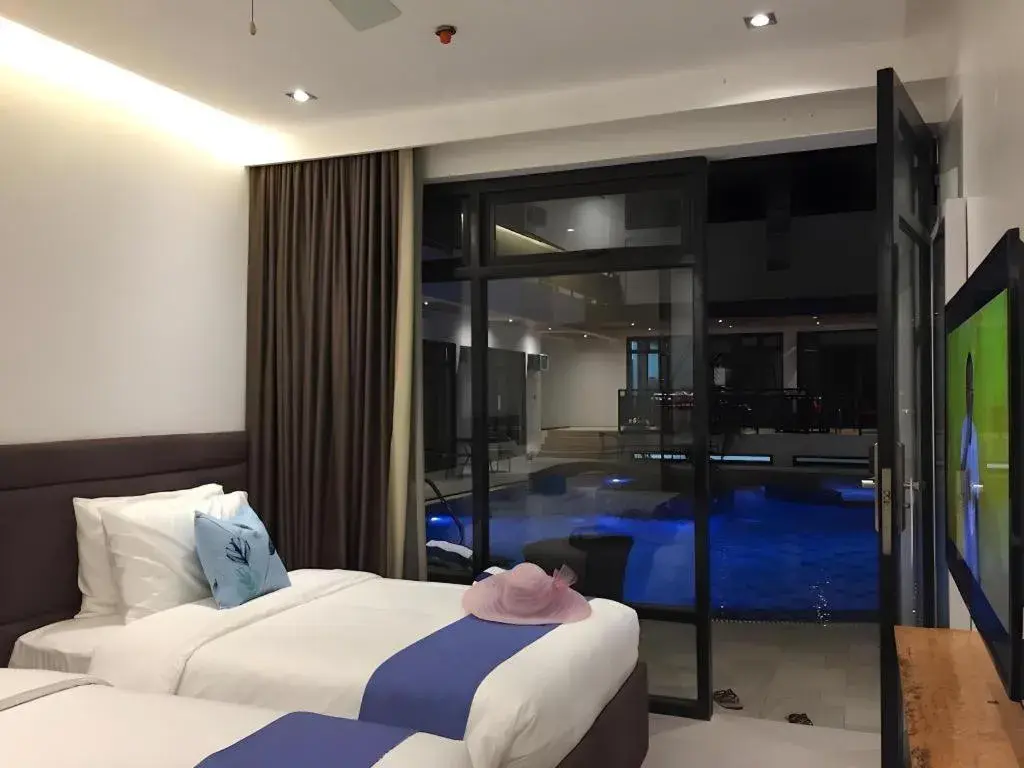 Bed in White Breeze Palawan Boutique Hotel Bed in White Breeze Palawan Boutique Hotel