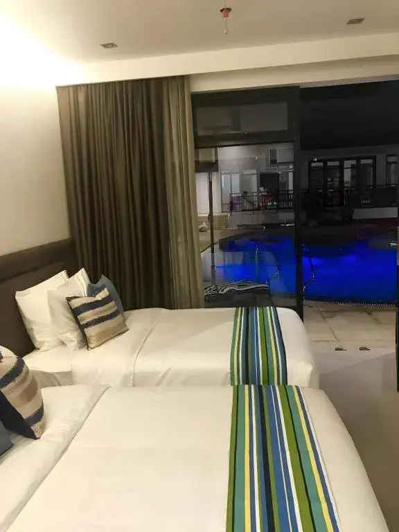 Bed in White Breeze Palawan Boutique Hotel Bed in White Breeze Palawan Boutique Hotel