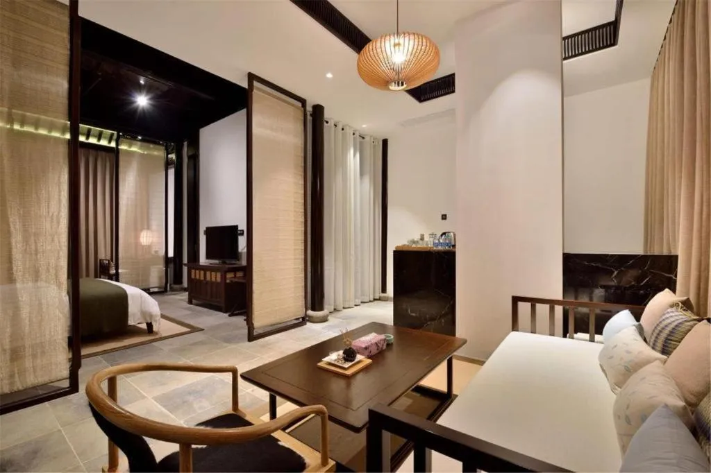 Bed in Blossom Hill Inn Suzhou Tanhuafu