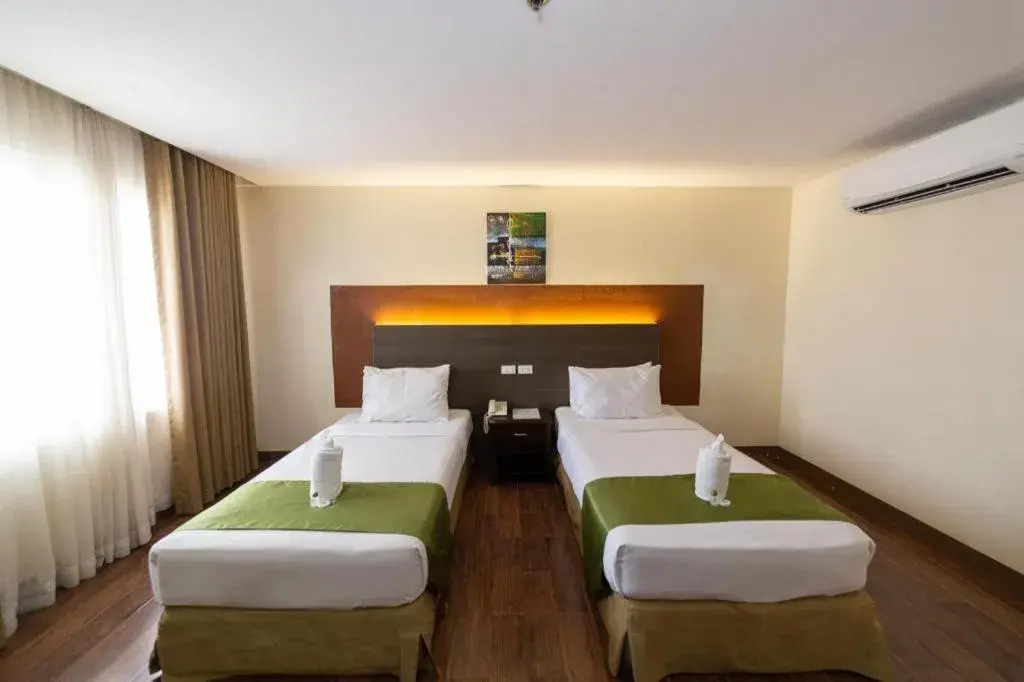 Bed in The Ritz Hotel at Garden Oases (Multiple-Use Hotel) Bed in The Ritz Hotel at Garden Oases (Multiple-Use Hotel)